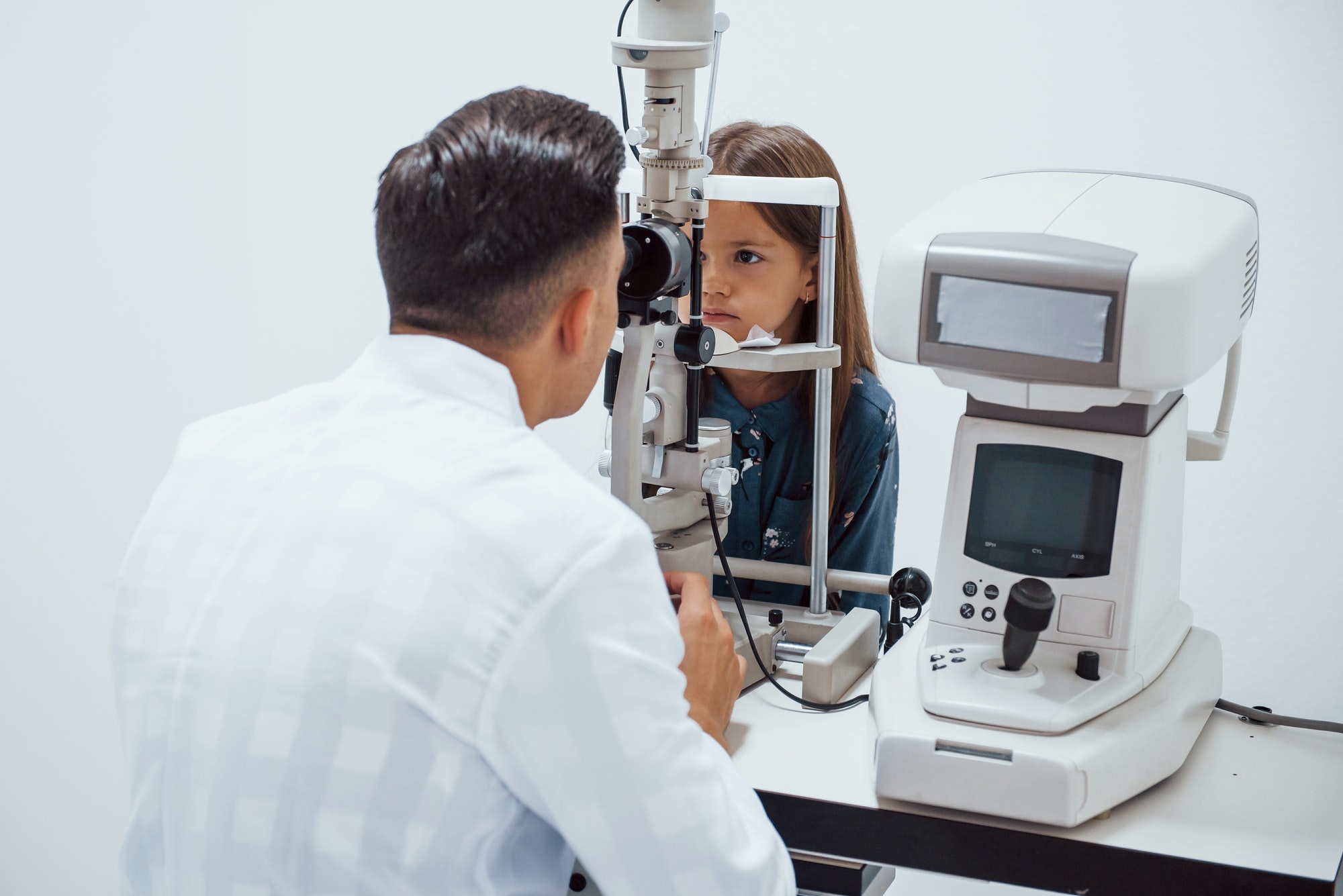 young-ophthalmologist-is-with-little-female-visitor-in-the-clinic.jpg young-ophthalmologist-is-with-little-female-visitor-in-the-clinic.jpg